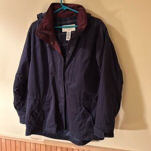 Eddie Bauer, women’s navy blue and plaid lined jacket. Size L